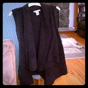 Say what fuzzy black vest